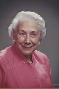 Solo picture of Mrs. Bobbie Rainy Sublett in her elderly years wearing pink and smiling